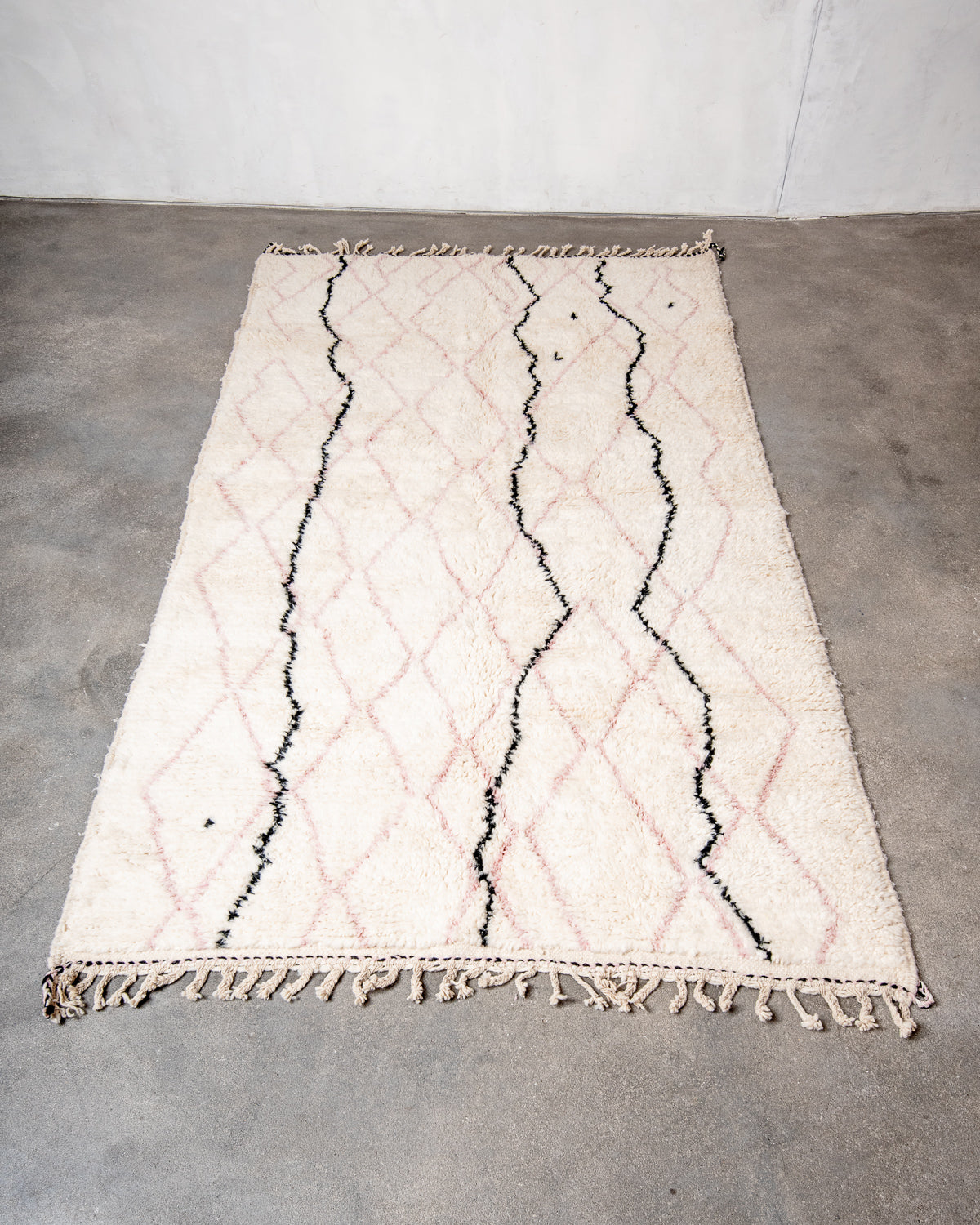 Modern, designer, handcrafted Berber rug from Morocco. Beniourain carpet with beautiful colours and patterns and fluffy wool texture.